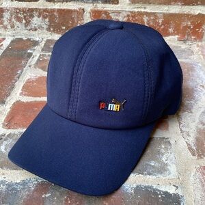 Puma navy strap back ball cap with metal logo